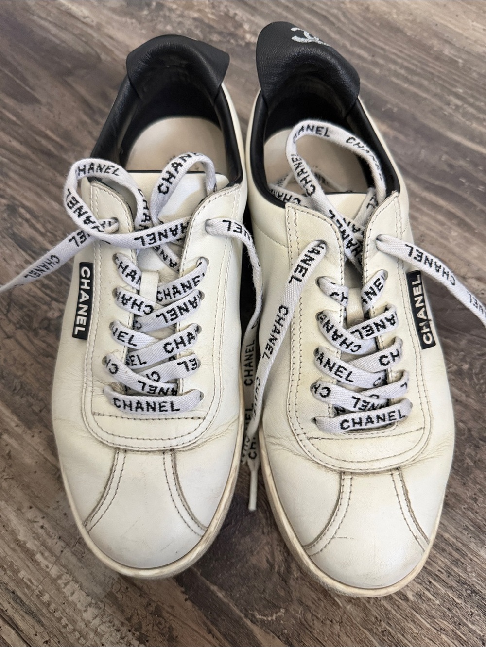 CHANEL White and black  Leather Sneakers with branded laces